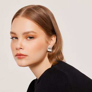 Ear clips in Sterling Silver meticulously finished with a satin sheen by Gexist®