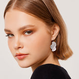 Earrings in Sterling Silver whose subtle combination of soft satin and textured brushed finish by Gexist®