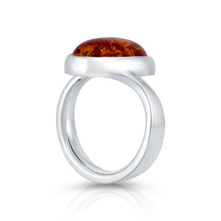 Sterling Silver ring featuring a designer ring with a shiny finish and a magnificent oval Amber cab by Gexist®