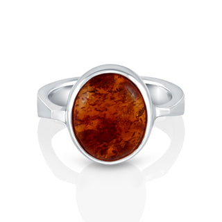 Sterling Silver ring featuring a designer ring with a shiny finish and a magnificent oval Amber cab by Gexist®