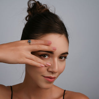 Sterling Silver ring featuring a designer ring with a shiny finish and a magnificent round Labradorite cab by Gexist®