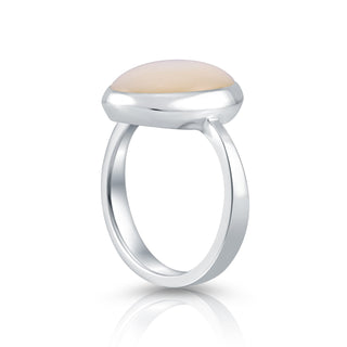 Sterling Silver ring featuring a designer ring with a shiny finish on which is set a magnificent oval Mother-of-Pearl cab by Gexist®
