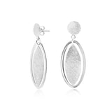 Sterling Silver stud earrings featuring a delicately brushed Silver leaf surrounded by an oval by Gexist®