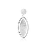 Sterling Silver stud earrings featuring a delicately brushed Silver leaf surrounded by an oval by Gexist®