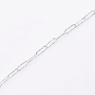 Sterling silver bracelet featuring several shiny rectangular rings with a hammered finish by Gexist®