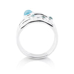 Sterling silver ring with 3mm and 6mm blue topazes on several bands by Gexist®