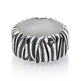 Sterling silver ring with a raised hammered and oxidised finish by Gexist®