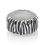 Sterling silver ring with a raised hammered and oxidised finish by Gexist®