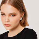 Stud earrings in Sterling Silver with a satin-brushed finish by Gexist®