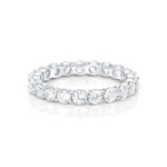 Sublime Sterling Silver Eternity ring adorned with Zircons mounted on claws all around the band by Gexist®
