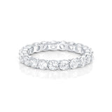 Sublime Sterling Silver Eternity ring adorned with Zircons mounted on claws all around the band by Gexist®