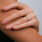 Thin ring made up of small balls in polished Sterling Silver and a small central brilliant (Zircon) by Gexist®