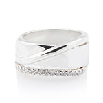 Wide Sterling Silver ring adorned with a line of 2mm white Zirconia stones by Gexist®