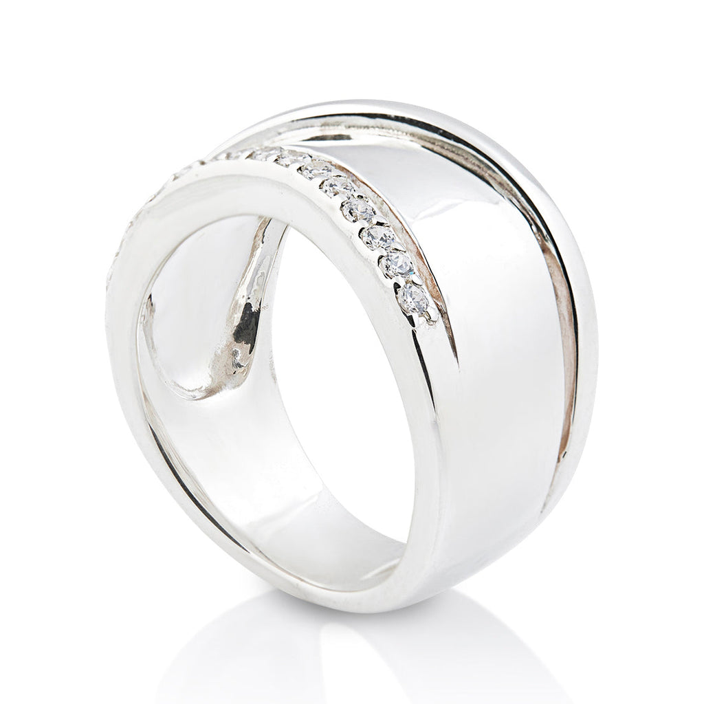 Wide Sterling Silver ring adorned with a line of 2mm white Zirconia stones by Gexist®