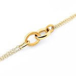 Bracelet in Sterling Silver with yellow gold plating made of a triple chain with oval rings of different sizes and finishes between shiny and brushed by Gexist®