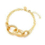 Bracelet in Sterling Silver with yellow gold plating made of a triple chain with oval rings of different sizes and finishes between shiny and brushed by Gexist®