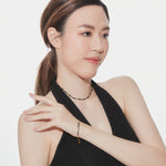 Bracelet with yellow gold plating sterling silver beads and faceted onyx beads by Gexist®