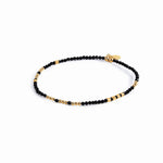 Bracelet with yellow gold plating sterling silver beads and faceted onyx beads by Gexist®