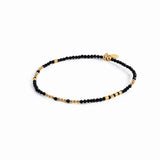 Bracelet with yellow gold plating sterling silver beads and faceted onyx beads by Gexist®