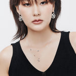 Double necklace in Sterling Silver with a moon and stars by Gexist®