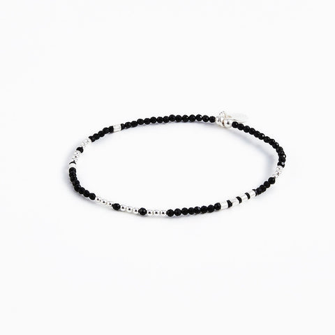 Elastic bracelet with sterling silver and faceted onyx beads by Gexist®