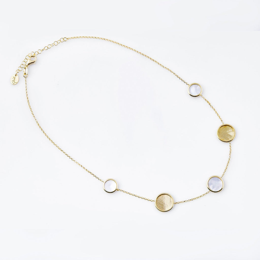 Necklace in Sterling silver and yellow gold plating, composed of brushed discs and mother-of-pearl discs, symmetrically arranged by Gexist®
