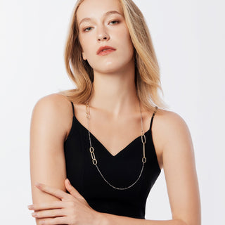 Necklace made of Sterling silver with yellow gold plating and a chain made of several oval, shiny and polished rings of different sizes by Gexist®