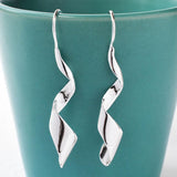 Silver Dancing Ribbon Earrings (MD264E) by Gexist®