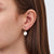 Sleeper earrings with a beautiful round mother-of-pearl and gold plating sterling silver by Gexist®