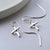 Sterling Silver Cross Earrings (ME362E) by Gexist®