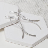 Sterling Silver Curved Ribbon Earrings (ME405E) by Gexist®