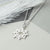 Sterling Silver Fire Star Necklace (MF513P) by Gexist®