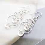 Sterling Silver Swinging Circles Earrings (MD348) by Gexist®