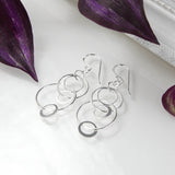 Sterling Silver Swinging Circles Earrings (MZB56) by Gexist®