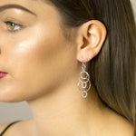 Sterling Silver Swinging Circles Earrings (MZB56) by Gexist®