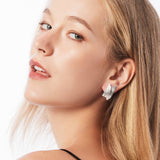Sterling Silver clip-on earrings in the shape of satin silver claws by Gexist®