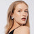 Sterling Silver clip-on earrings in the shape of thick, slightly curved discs with a satin finish by Gexist®