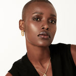 Sterling Silver yellow gold plating stud earrings in a modern oval shape by Gexist®