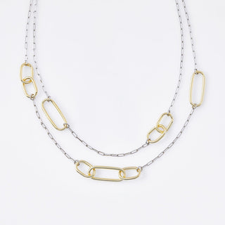 Sterling silver and yellow gold plating necklace, with a double chain made up of several oval, shiny and polished rings of different sizes by Gexist®