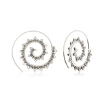 Sterling silver earrings in the shape of an oxidised spiral by Gexist®