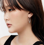 Sterling silver hoop earrings with garnet beads by Gexist®