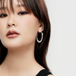Sterling silver hoop earrings with garnet beads by Gexist®