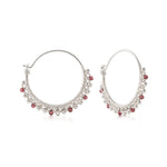 Sterling silver hoop earrings with garnet beads by Gexist®