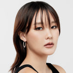 Sterling silver hoop earrings with garnet beads by Gexist®
