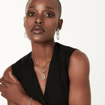 Sterling silver necklace with marine link chain featuring an elegant flat oval pendant with brushed finish by Gexist®