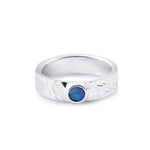 Sterling silver ring with a shiny hammered finish, adorned with a doublet Opal (round 4mm) by Gexist®
