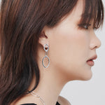 Sterling silver stud earrings with 3 shiny rings by Gexist®