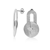 Stud earrings in Sterling Silver consisting of an oval-shaped element connected to a disc, both with a brushed finish by Gexist®